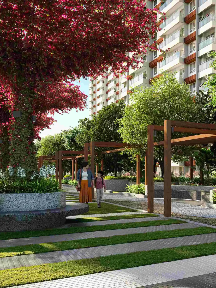 Mahindra Blossom, artistic impression A garden walk under pink bougainvillea canopies beside the towers