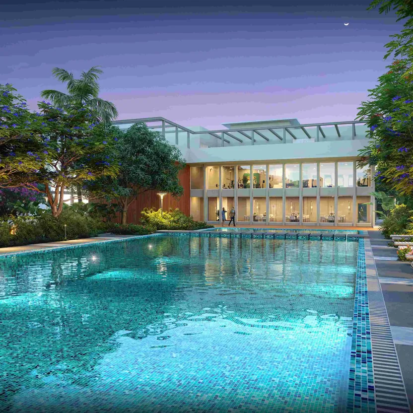 The half-Olympic swimming pool with a deck and loungers